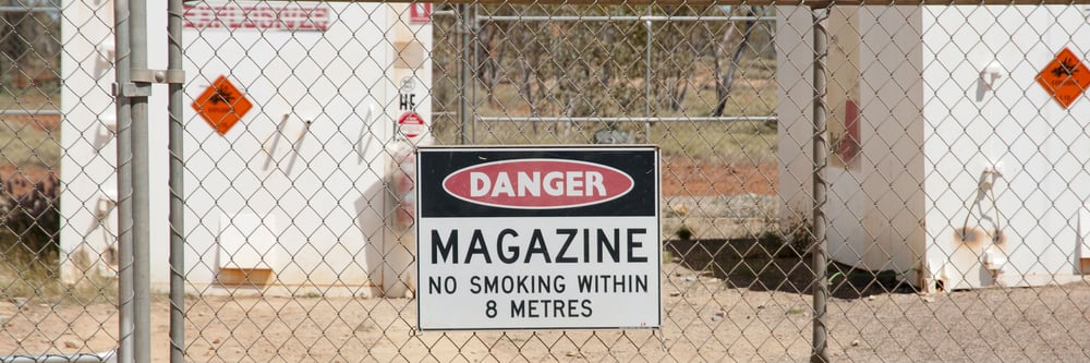Danger sign on metal gates